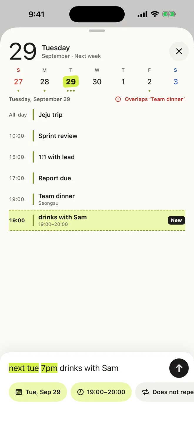Typing “next tue 7pm drinks with Sam”: the date and time are highlighted and the new event appears in Tuesday’s schedule with an overlap warning